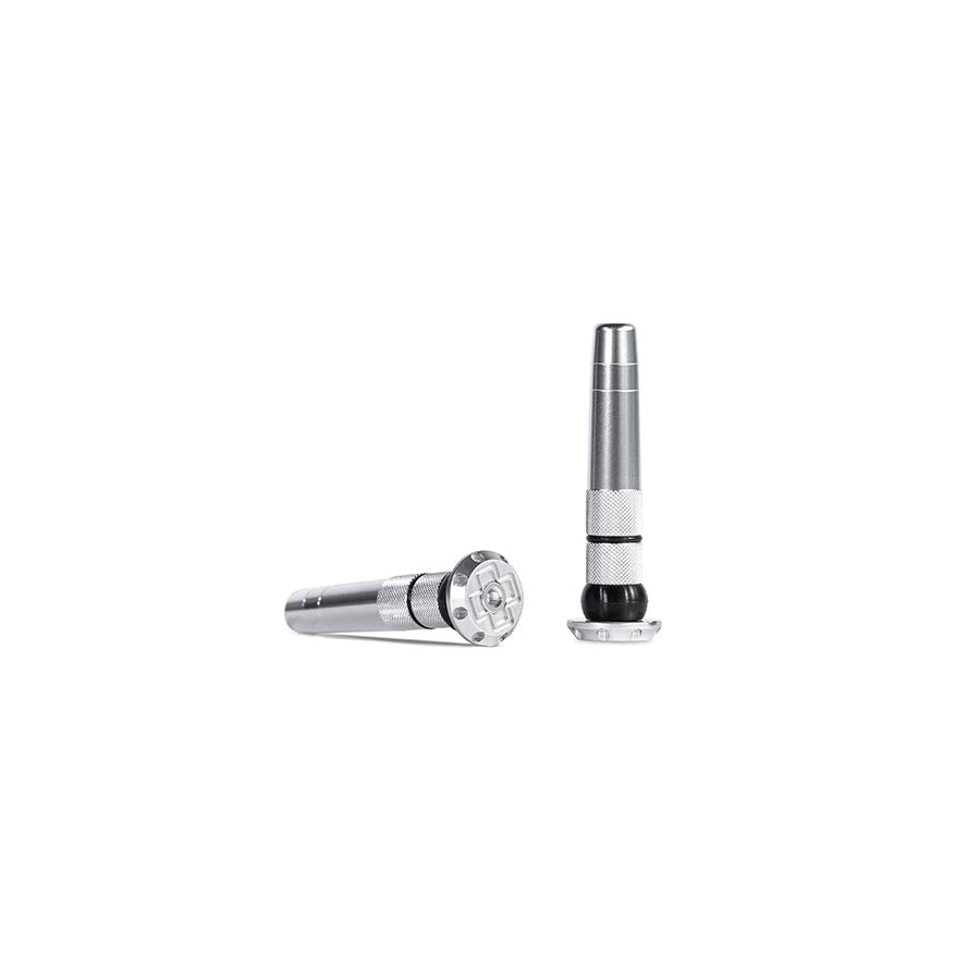 Pair of Muc-Off Stealth Tubeless Plugs for tubeless tire repair, black, designed for quick and effective puncture fixes.