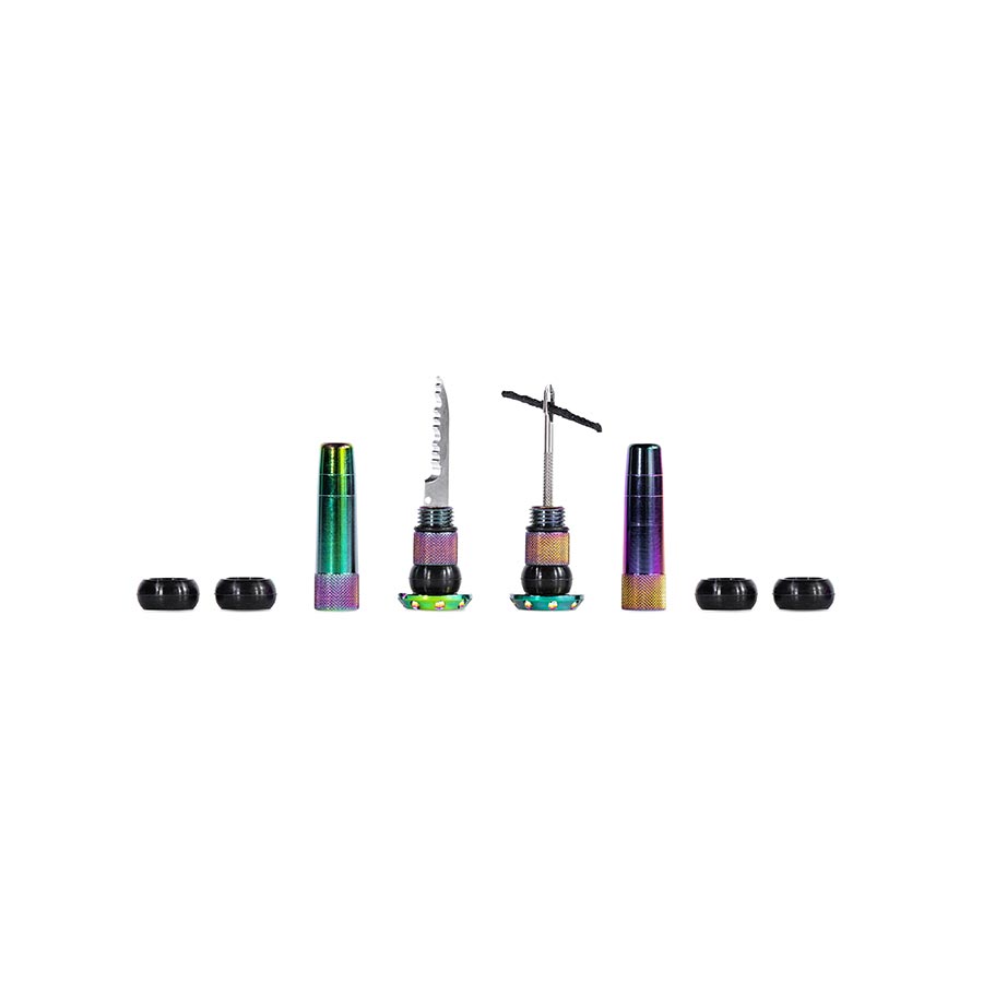Black Muc-Off Stealth Tubeless Plugs for tubeless tire repair, shown in a pair with compact design and durable construction.