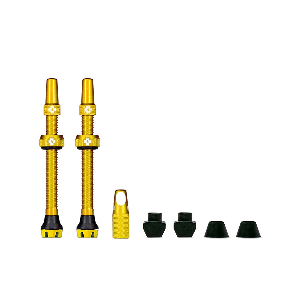Pair of Muc-Off Tubeless Valve V2 Presta valves in black, 44mm length, designed for tubeless bike tire systems.