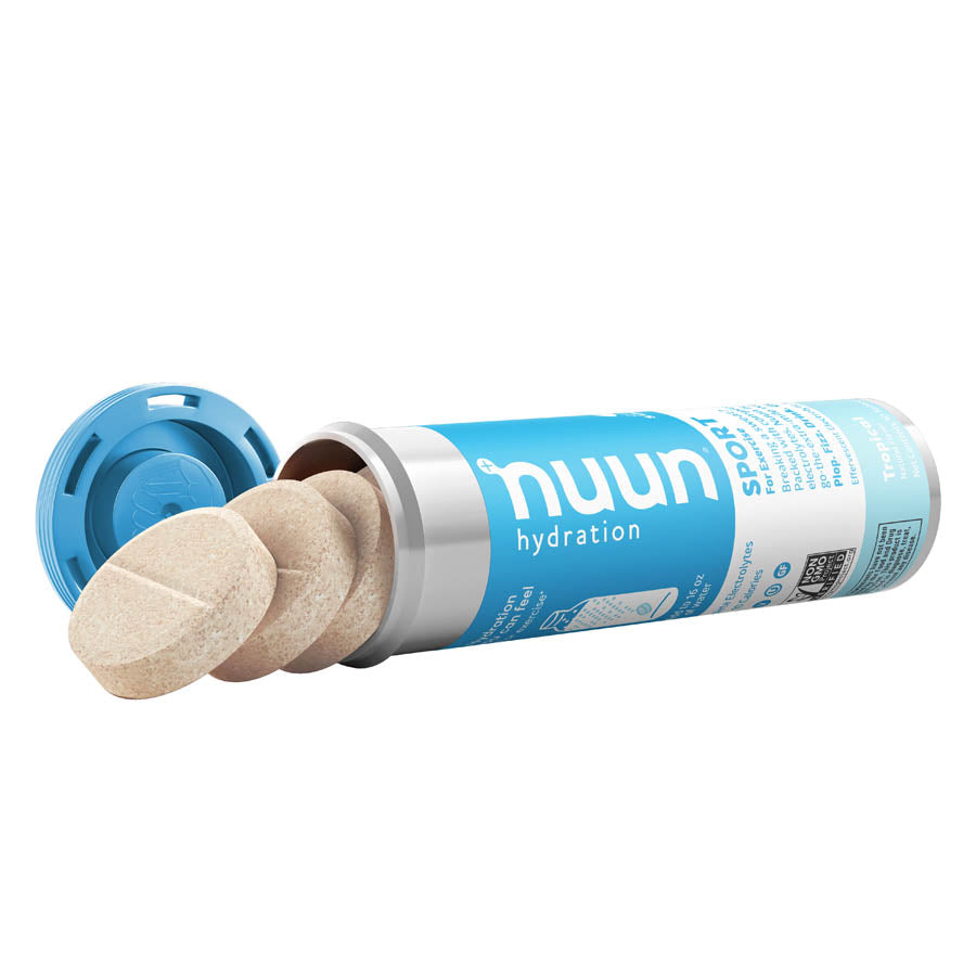 Nuun Sport Tri-Berry drink mix box with 8 servings, featuring colorful packets and branding for hydration and energy.