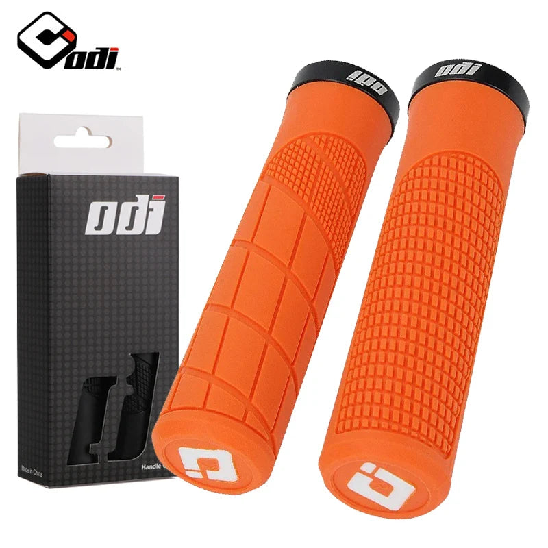 Black ODI Clamp On Rubber Grips for bikes, showing textured rubber surface and secure clamp mechanism.