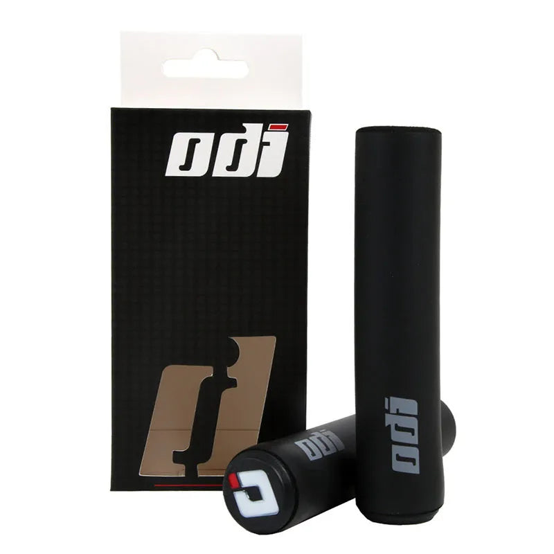 Black ODI Silicone Grips for bikes, featuring textured surface for improved grip and comfort.