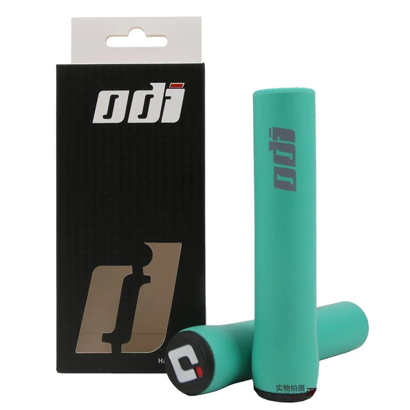 Black ODI Silicone Grips for bikes, featuring a textured surface for enhanced grip and comfort during rides.