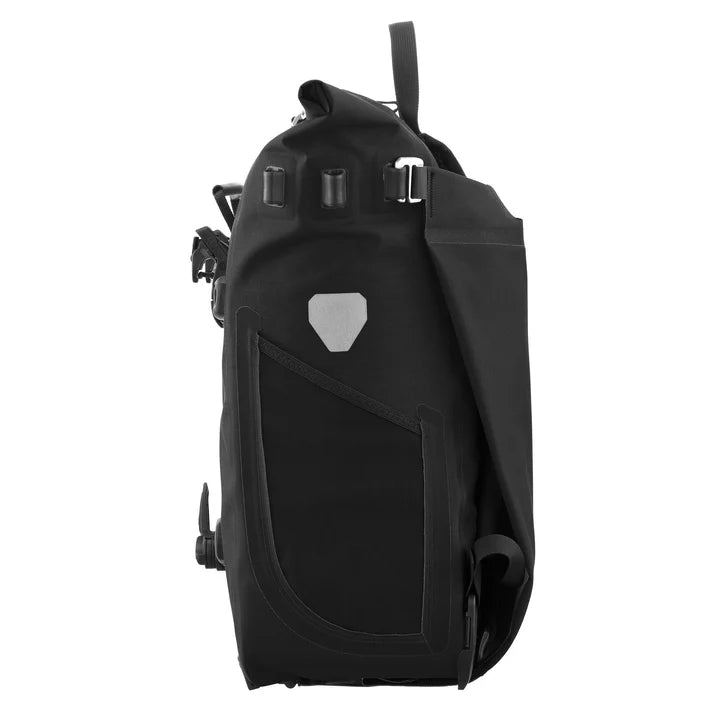 Ortlieb Urban Vario PS QL3.1 26L panniers mounted on bike rack, waterproof Ortlieb bike panniers for urban commuting.