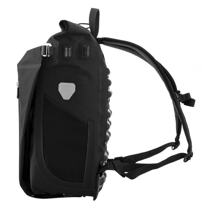 Ortlieb Urban Vario PS QL3.1 26L panniers mounted on bike rack, waterproof bicycle panniers for commuting and urban cycling.
