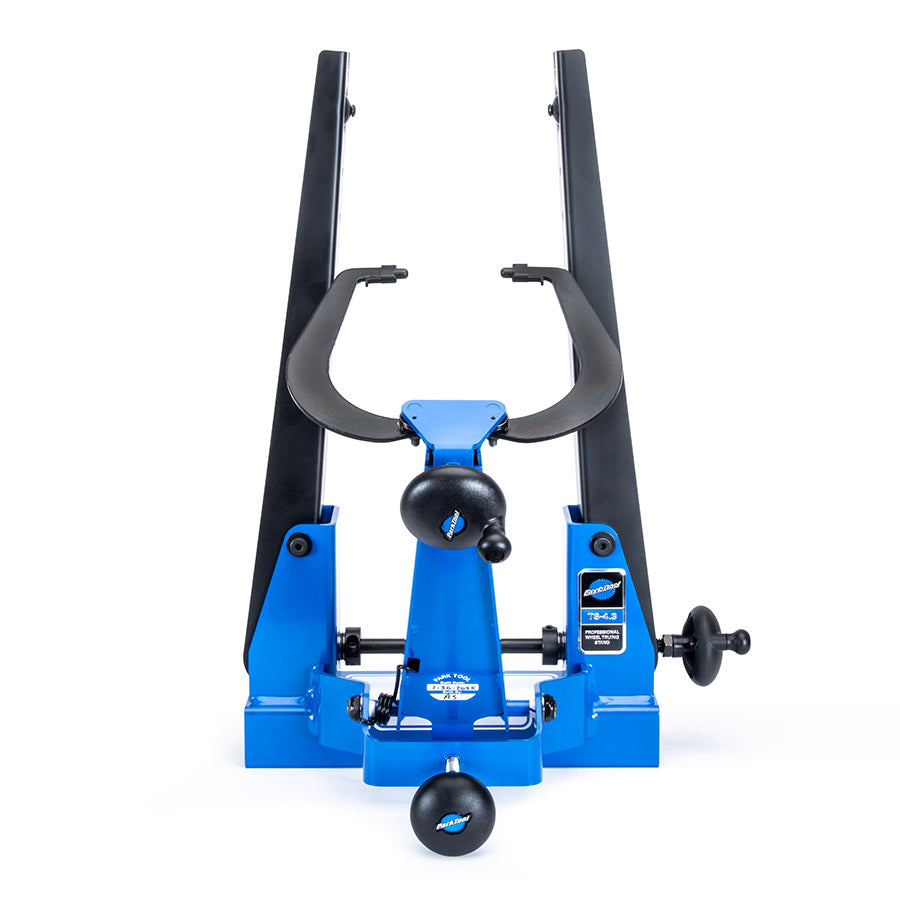 Park Tool TS-4.3 professional wheel truing stand with adjustable arms and measurement gauges for accurate bike wheel alignment.