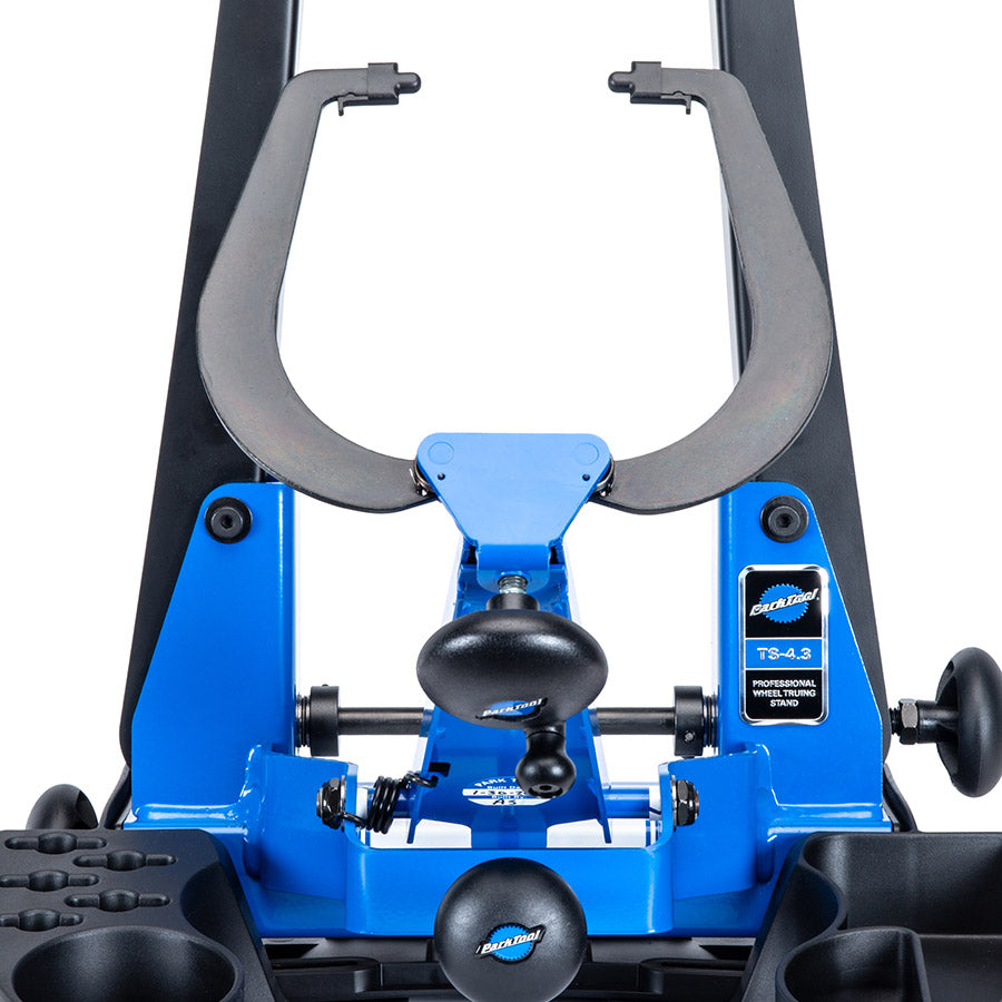 Park Tool TS-4.3 professional wheel truing stand for bike wheel alignment and repair, with adjustable supports and measurement gauges.