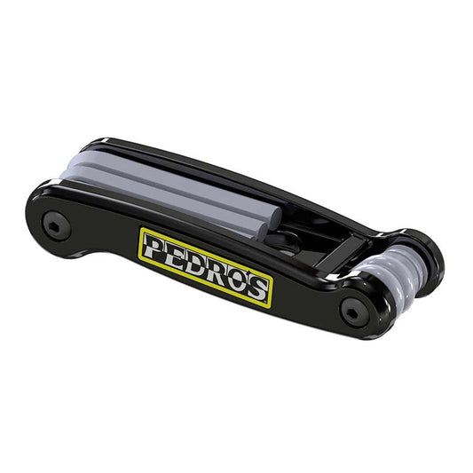 Pedros folding wrench set with hex keys and screwdrivers, compact multi-tool for bike repairs and adjustments.