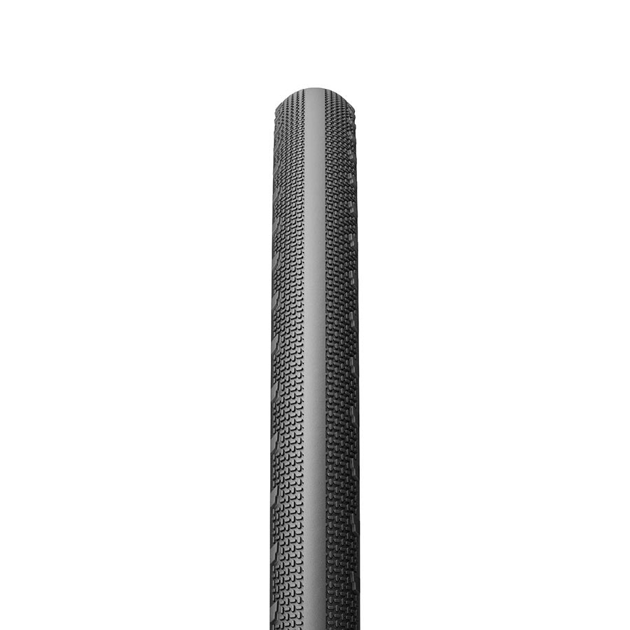 Pirelli Cinturato All Road gravel tires 700x35c tanwall with tread pattern for mixed terrain cycling.