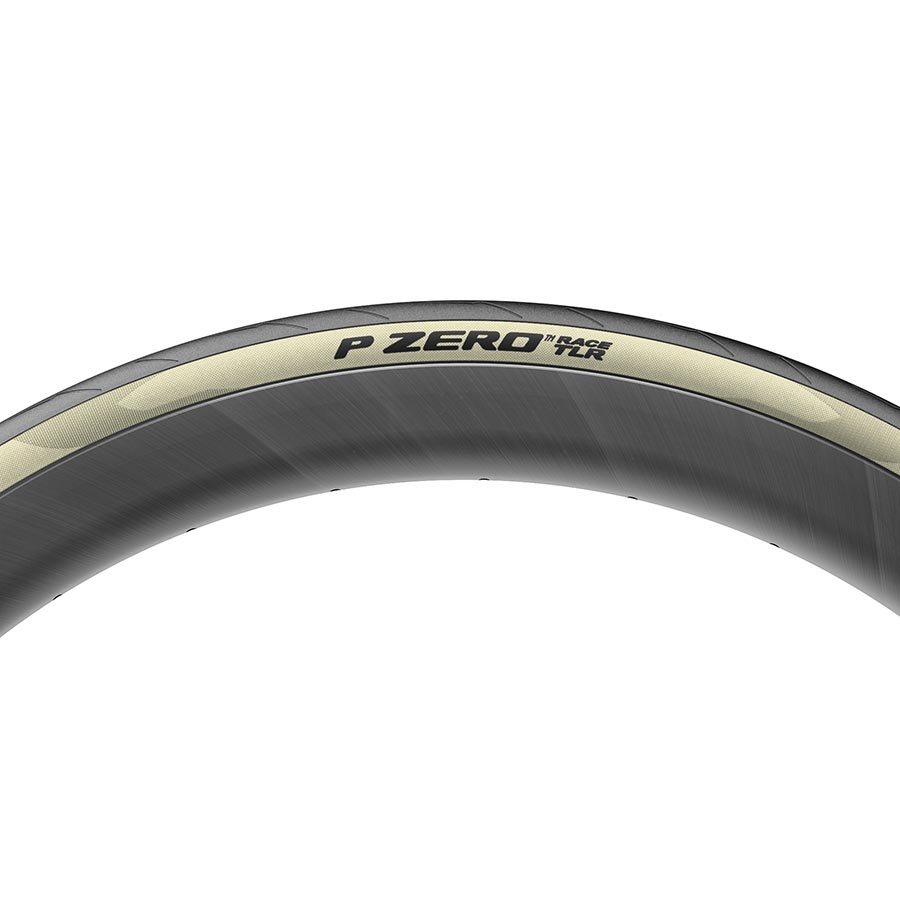 Pirelli PZero Race TLR road tire, 700x26c folding tubeless-ready with black rubber and sleek tread pattern.