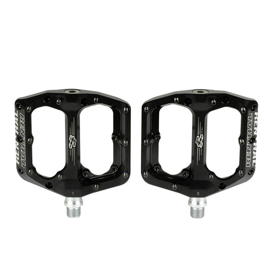 Black Renthal Revo-F platform pedals with durable metal construction and textured grip for mountain biking.