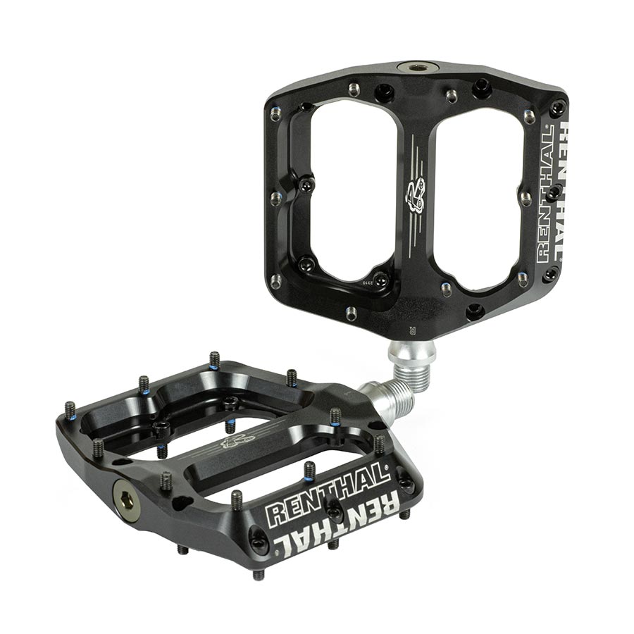 Black Renthal Revo-F platform pedals with durable design and textured grip for mountain biking or BMX riding.
