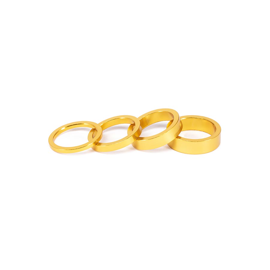Salt brand headset spacers in 3mm, 5mm, 8mm, and 10mm, made of black 6061 T6 aluminum, for bike handlebar setups.