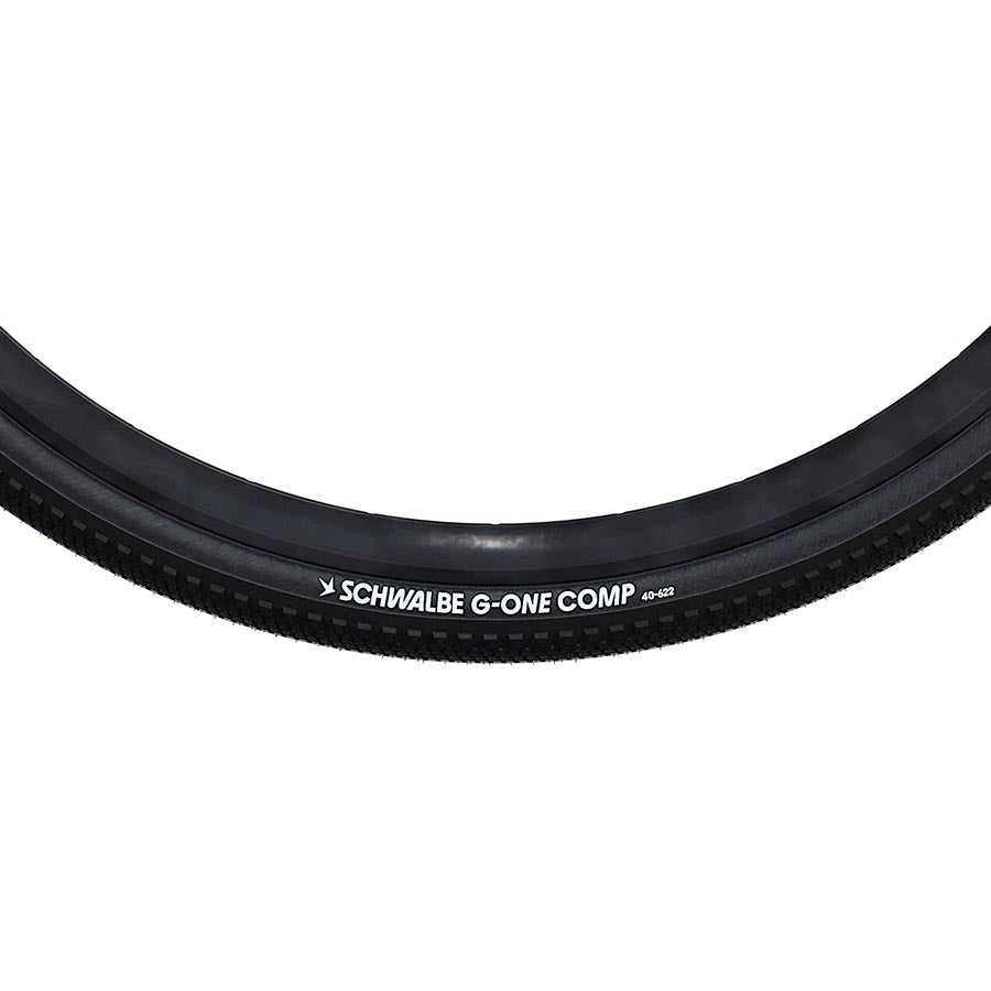Schwalbe G-One Comp gravel tires 28x1.35 with green compound, wire bead, and K-Guard protection, black rubber tread.
