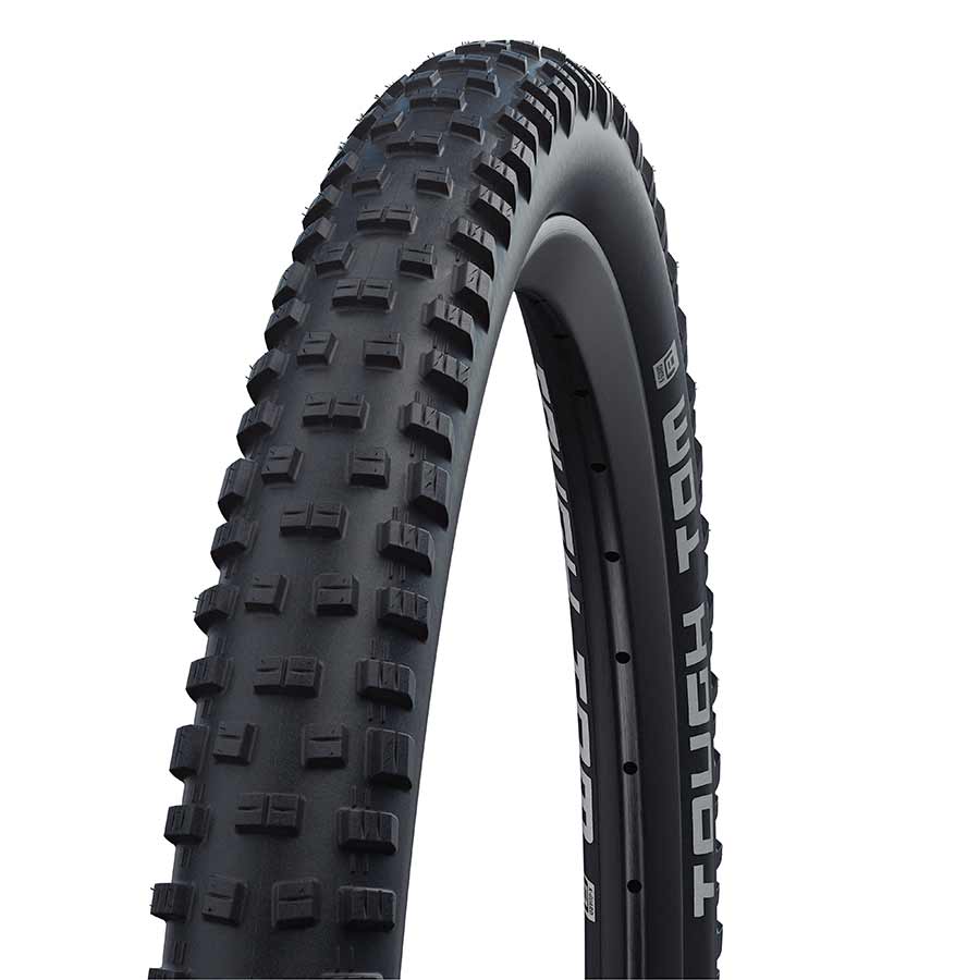 Schwalbe Tough Tom mountain tire with 26x2.25-inch wire clincher design, black rubber with Kevlar Guard and SBC construction.