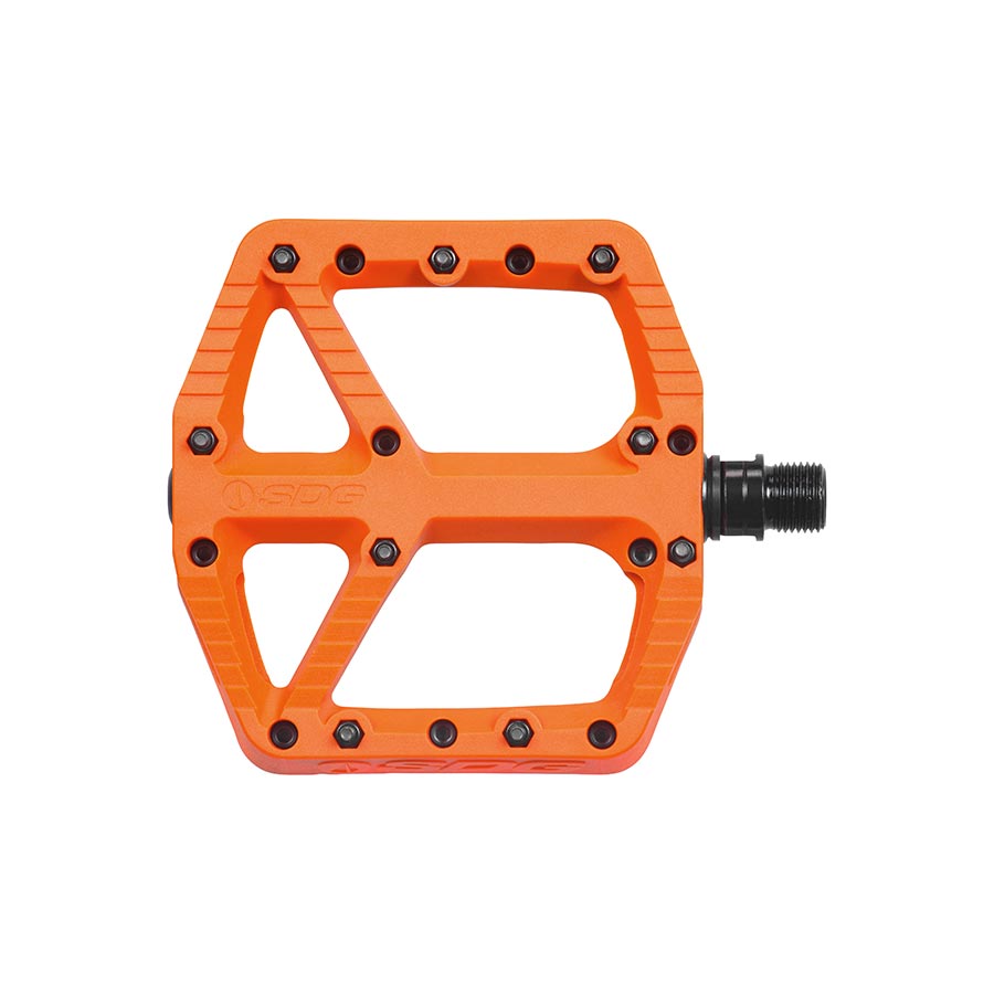 Pair of black SDG Components platform pedals for bikes, featuring durable construction and grip-enhancing design.