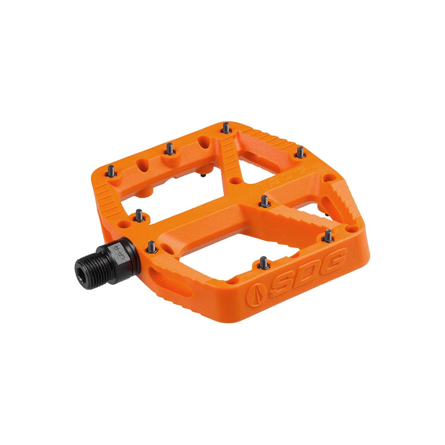Pair of black SDG Components Comp Pedal platform pedals for bikes, with textured grip and durable metal construction.