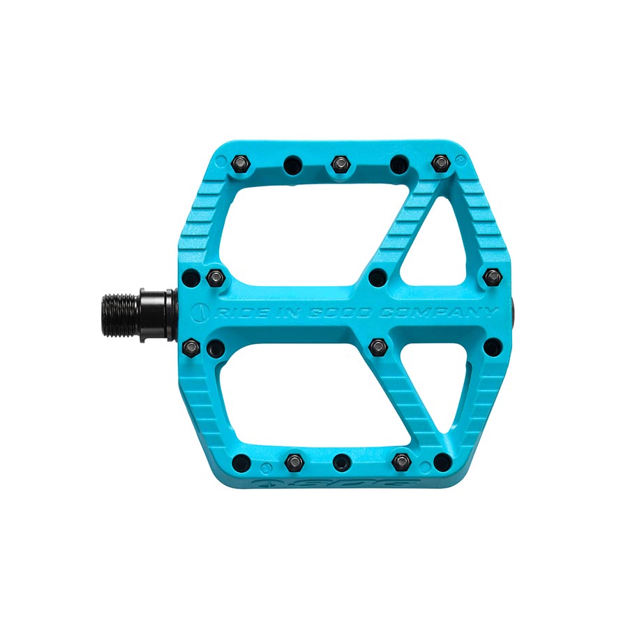 Pair of black SDG Components platform pedals with metal pins for mountain biking or BMX, featuring a sturdy, flat design.