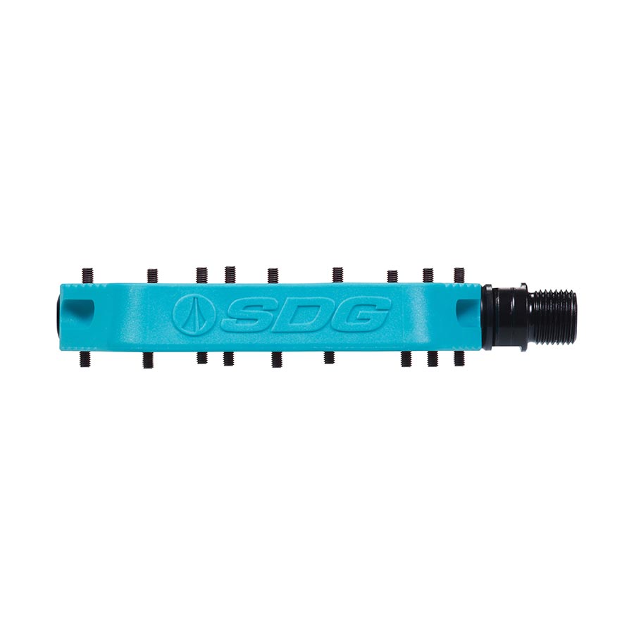 Pair of SDG Components black platform pedals, durable bike pedals with textured grip surfaces for secure footing.