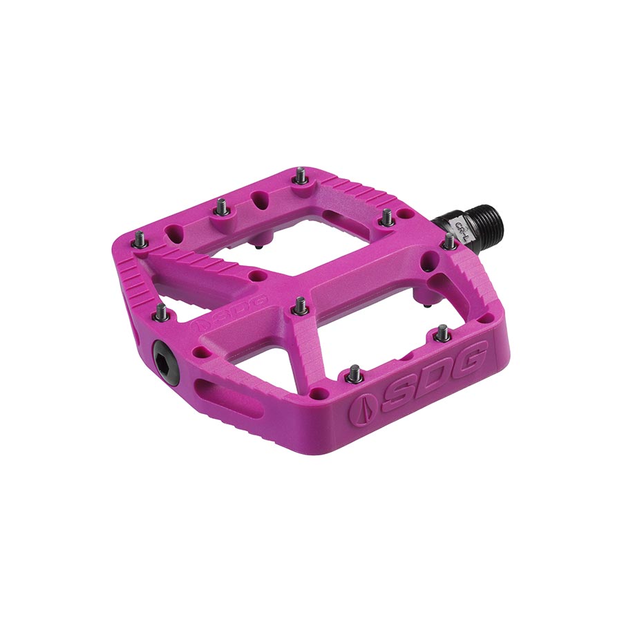 Pair of black SDG Components Comp Pedal platform pedals for bicycles, showing the textured surface and sturdy build