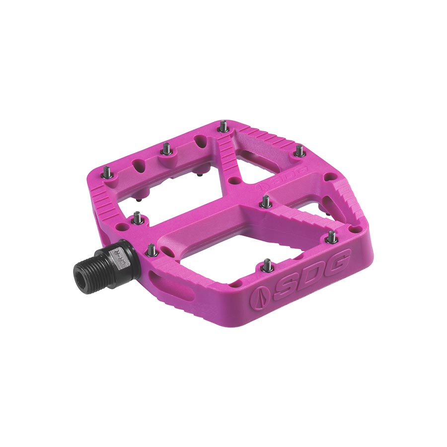 Pair of SDG Components black platform pedals with durable metal body and textured surface for bike cycling.