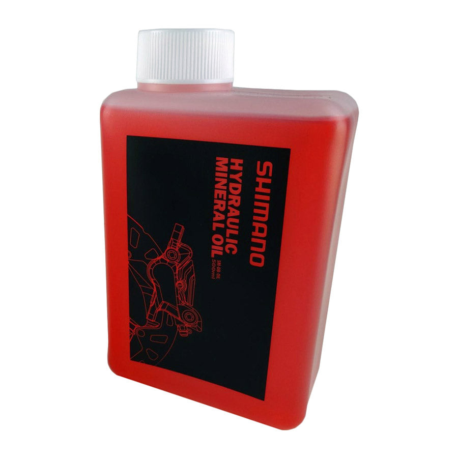Shimano mineral oil for disc brake bleed kits, 1-liter bottle, used for hydraulic brake maintenance and fluid replacement.