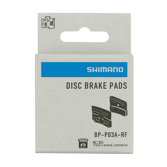 Shimano P-Type disc brake pads made of resin, designed for bicycle braking systems, shown in the image.