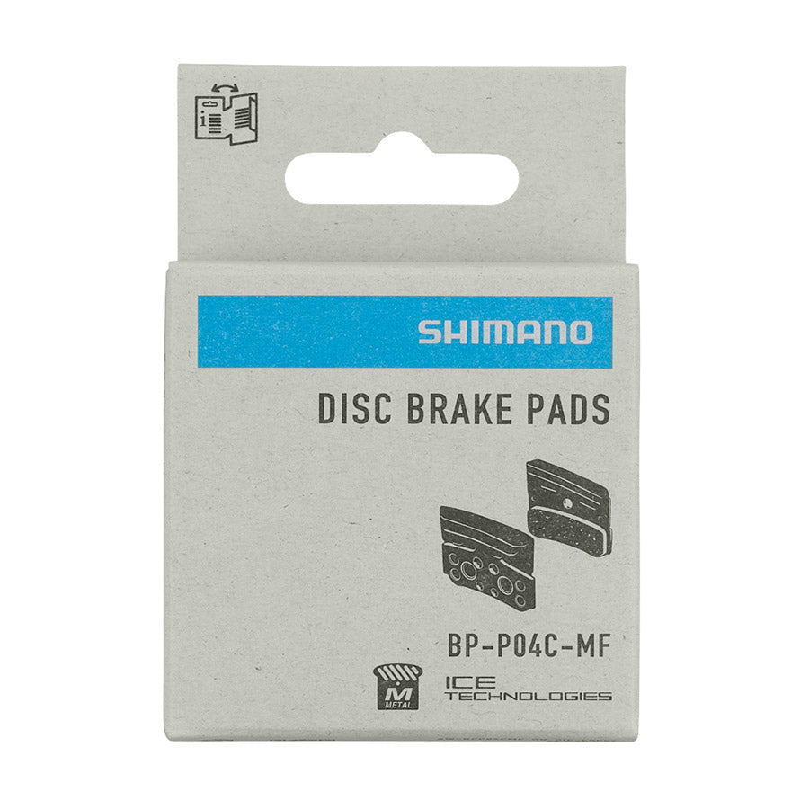 Shimano P-Type disc brake pads made of resin, designed for reliable stopping power on bicycles, shown in the image.