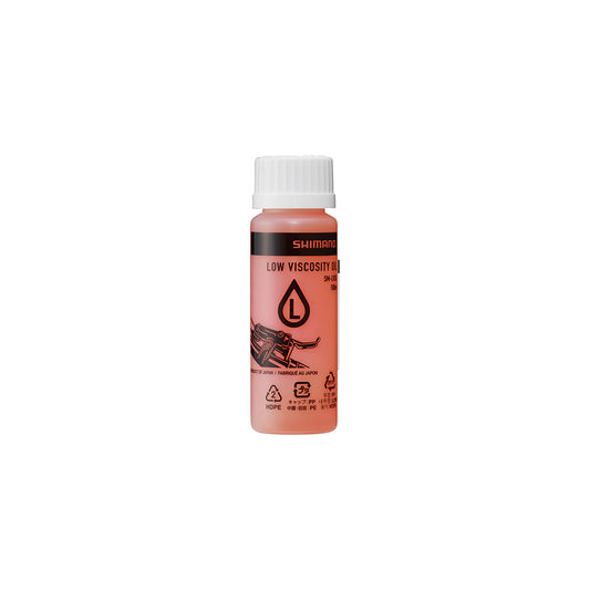 Shimano SM-LVOIL disc brake bleed kit with 100ml bottle of brake fluid, used for maintaining Shimano disc brake systems.