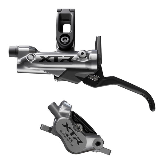 Shimano XTR BL-M9220 and BE-M9220 MTB hydraulic disc brakes set in black, with left-side brake lever and caliper on mountain bike.