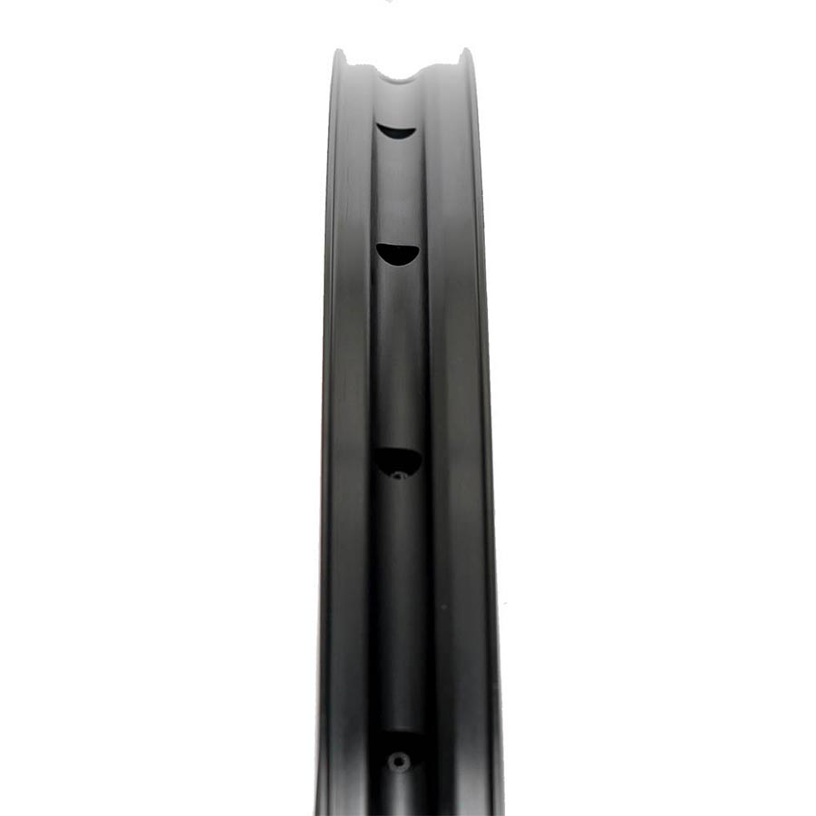 Black Stans No Tubes Arch MK4 26-hole mountain bike rims with a sleek design and durable construction.