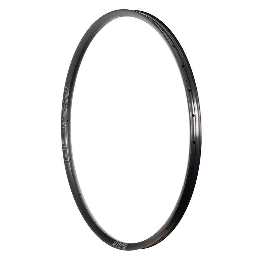 Black Stans No Tubes Arch MK4 26-hole rims for bicycles, showcasing the sleek design and durable construction.