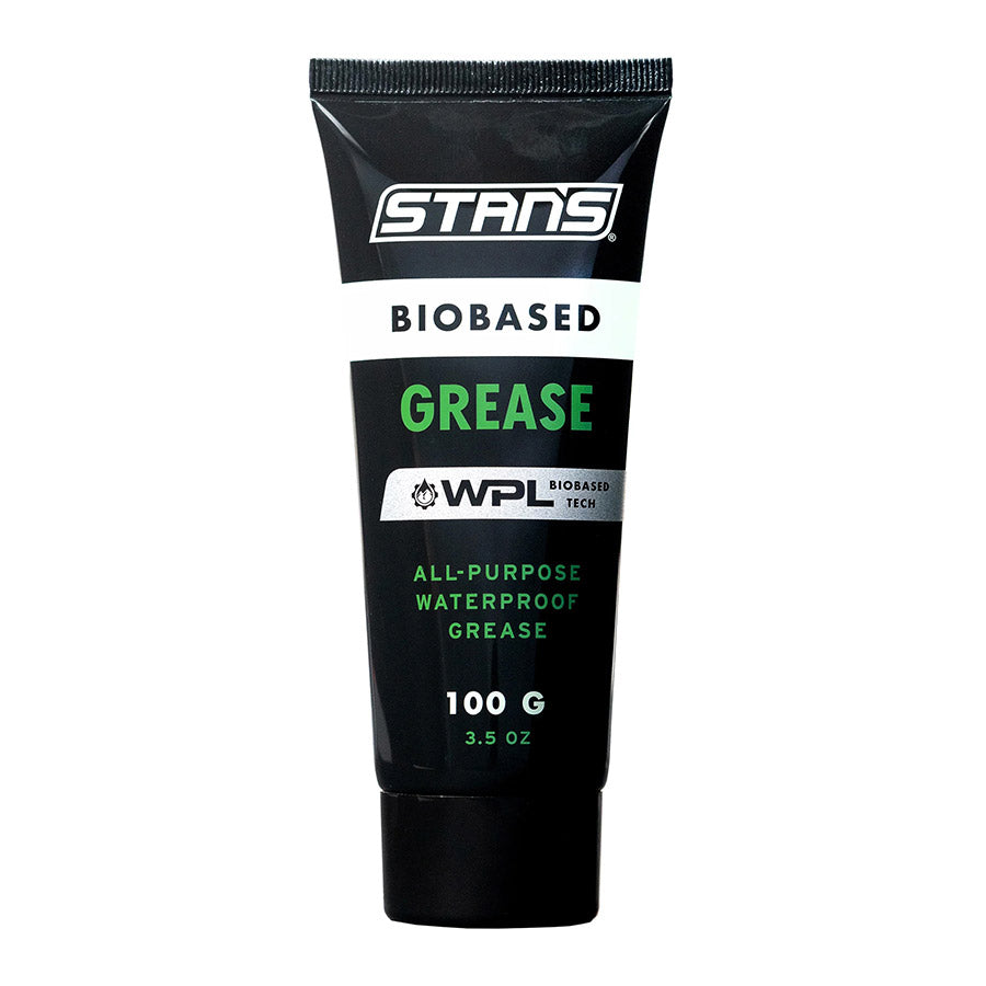 Stans No Tubes BioBased Grease 100g jar, bike lubricant with biodegradable formula and metal cap, close-up view.