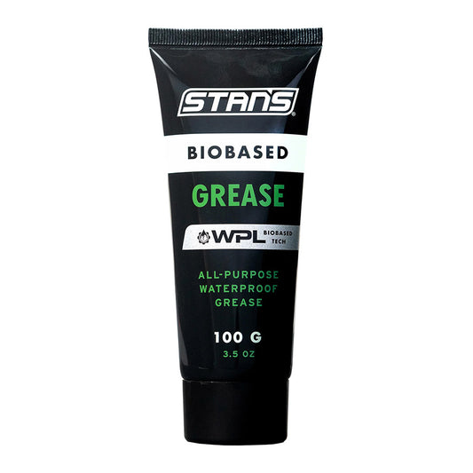 Stans No Tubes BioBased Grease 100g jar, bike lubricant with biodegradable formula and metal cap, close-up view.