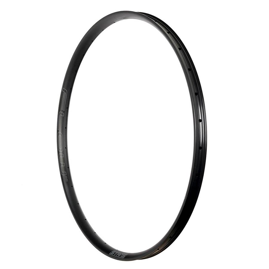 Stans No Tubes Flow MK4 26-hole black bicycle rims, lightweight and durable for mountain biking or road cycling.