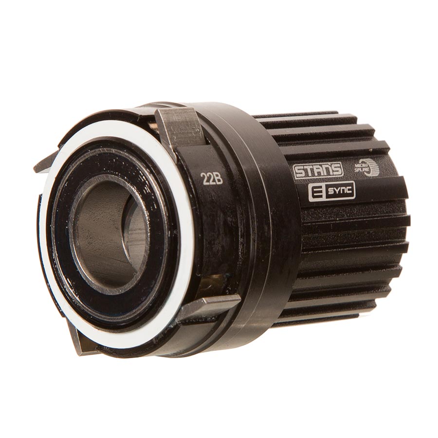 Stans No Tubes E-Sync/NEO freehub body for SRAM XD-R 11-12 speed mountain bike wheel, black metal with branding.