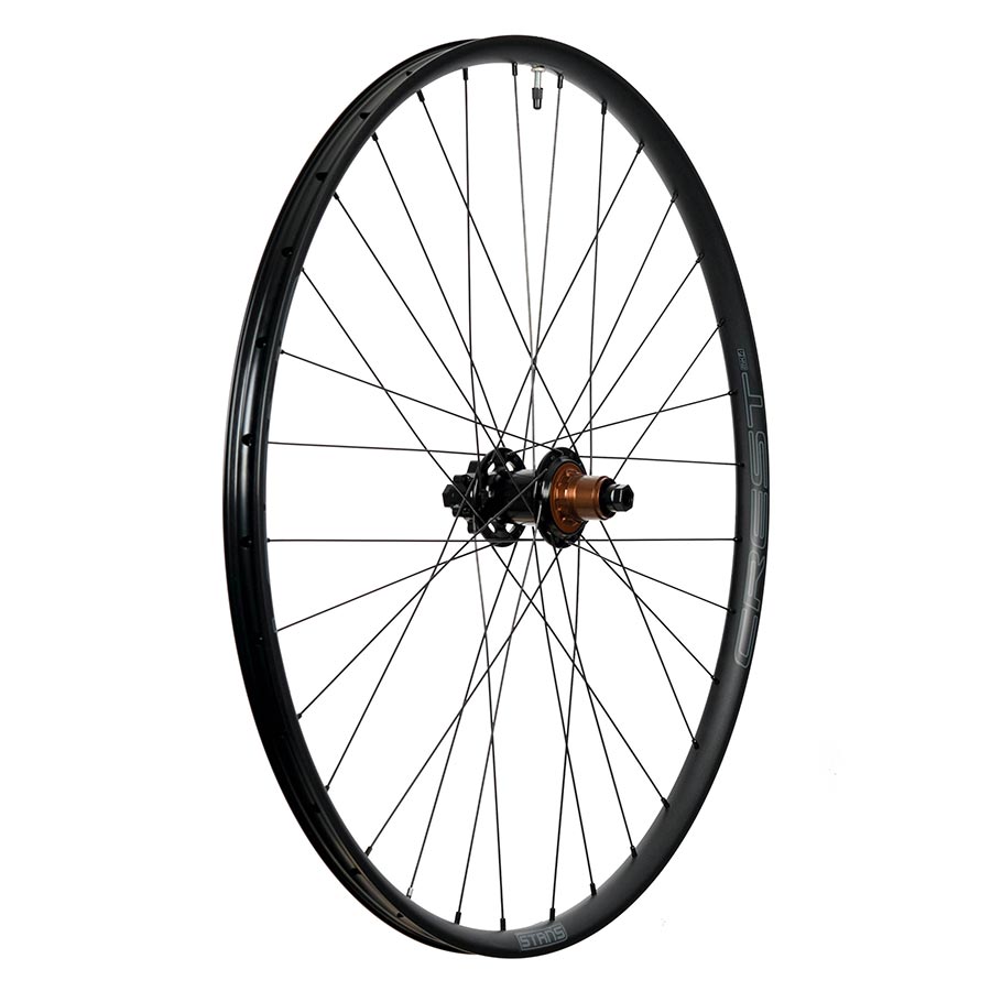 Stans No Tubes Crest MK4 27.5-inch mountain bike wheel with 32 spokes, 15mm thru-axle, Boost disc, and 6-bolt rotor mount