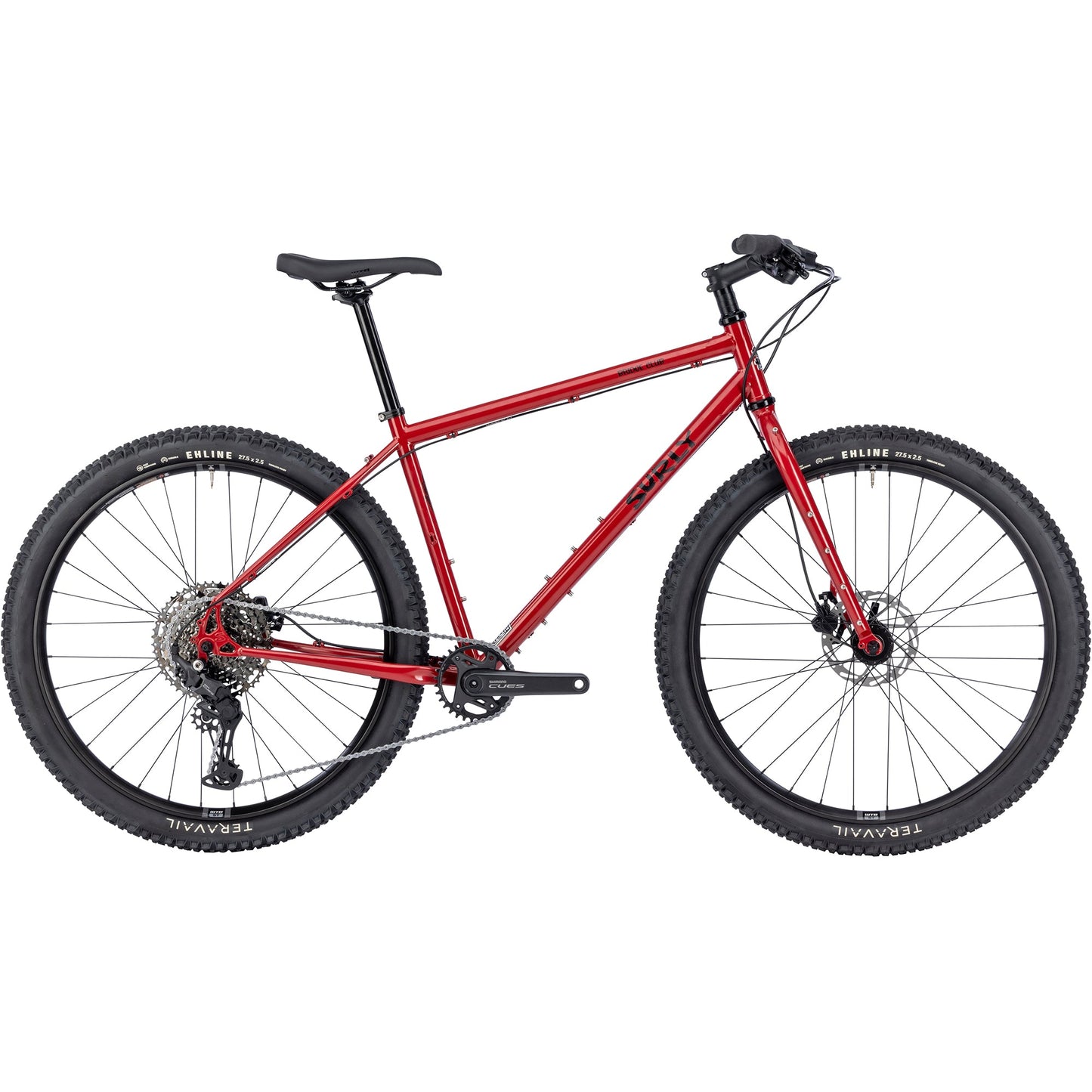Surly Bridge Club gravel bike in lingering cranberry color with 27.5-inch wheels and rugged frame for off-road adventures.