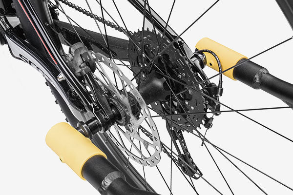Topeak JOURNEY TX Thru-Axle Trailer attached to a bicycle, ready for transporting gear on a bike trailer.