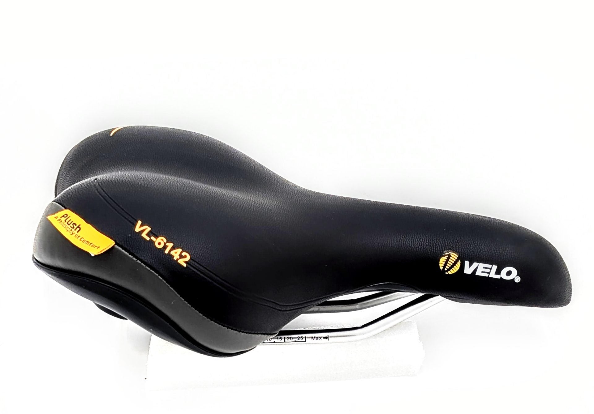 Velo Plush Saddle showing a wide, cushioned bicycle saddle with plush padding and durable cover, measuring 278mm by 150mm.