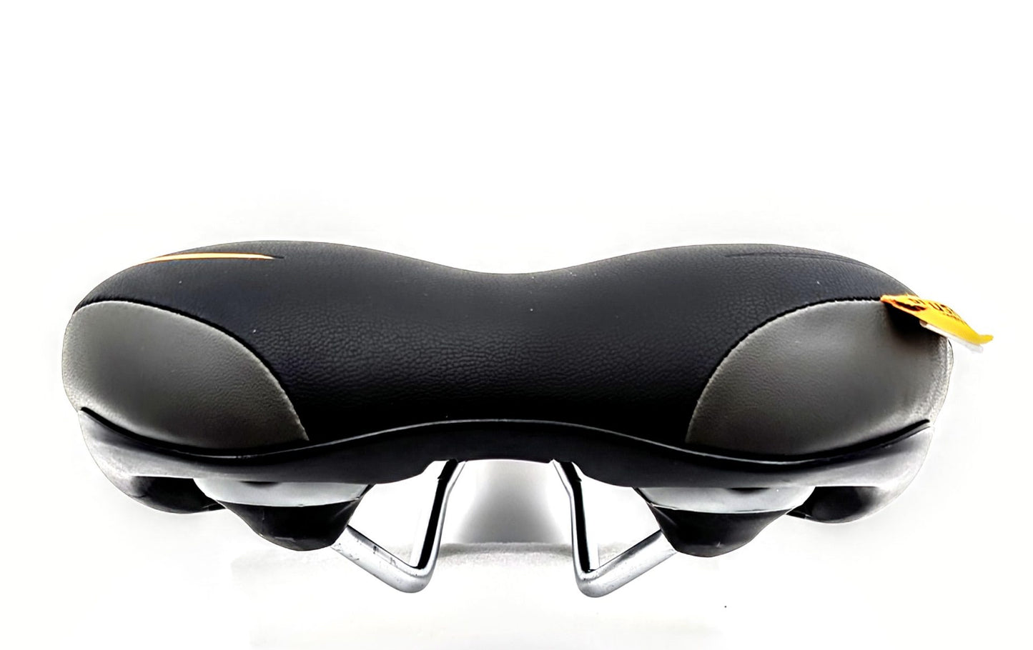Velo Plush Saddle showing a comfortable saddle with a soft padded surface and sleek design for cycling comfort.