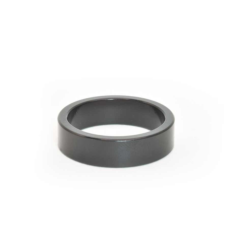 Wheels Manufacturing aluminum headset spacer set with 1.5mm, 2.5mm, 5mm, 7.5mm, and 10mm spacers, 105 pcs for bike headsets.