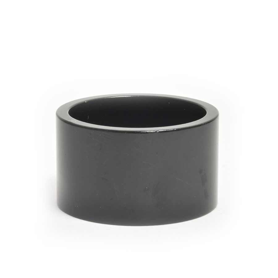 Set of Wheels Manufacturing aluminum headset spacers in various sizes including 1.5mm, 5mm, and 10mm for bike headsets.