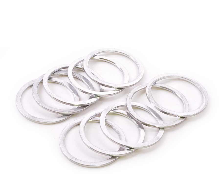 Wheels Manufacturing aluminum headset spacers in various sizes including 1.5mm, 5mm, and 10mm for bike headset assembly.