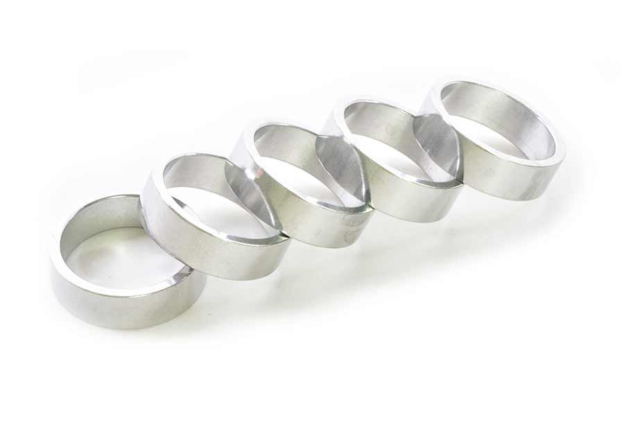 Wheels Manufacturing aluminum headset spacers in various sizes, including 1.5mm, 2.5mm, 5mm, 7.5mm, and 10mm, 105-piece set.