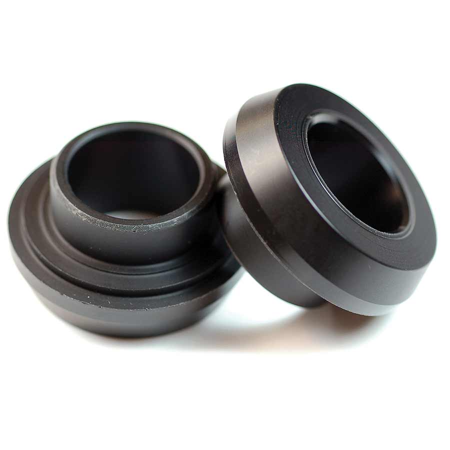 Wheels Manufacturing PF30-Shim bottom bracket adaptor for Shimano 24mm cranksets, showing the black aluminium component.