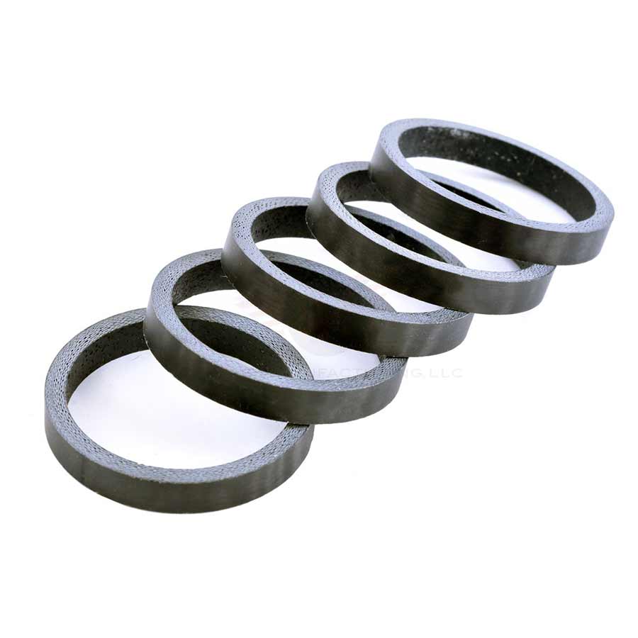 Set of five matte black carbon headset spacers from Wheels Manufacturing, 1-1/8 inch, 2.5mm height for bike steering systems