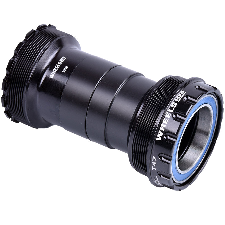 Wheels Manufacturing T47A 30mm ABEC3 threaded cups for bicycle bottom brackets, shown in close-up with metal finish