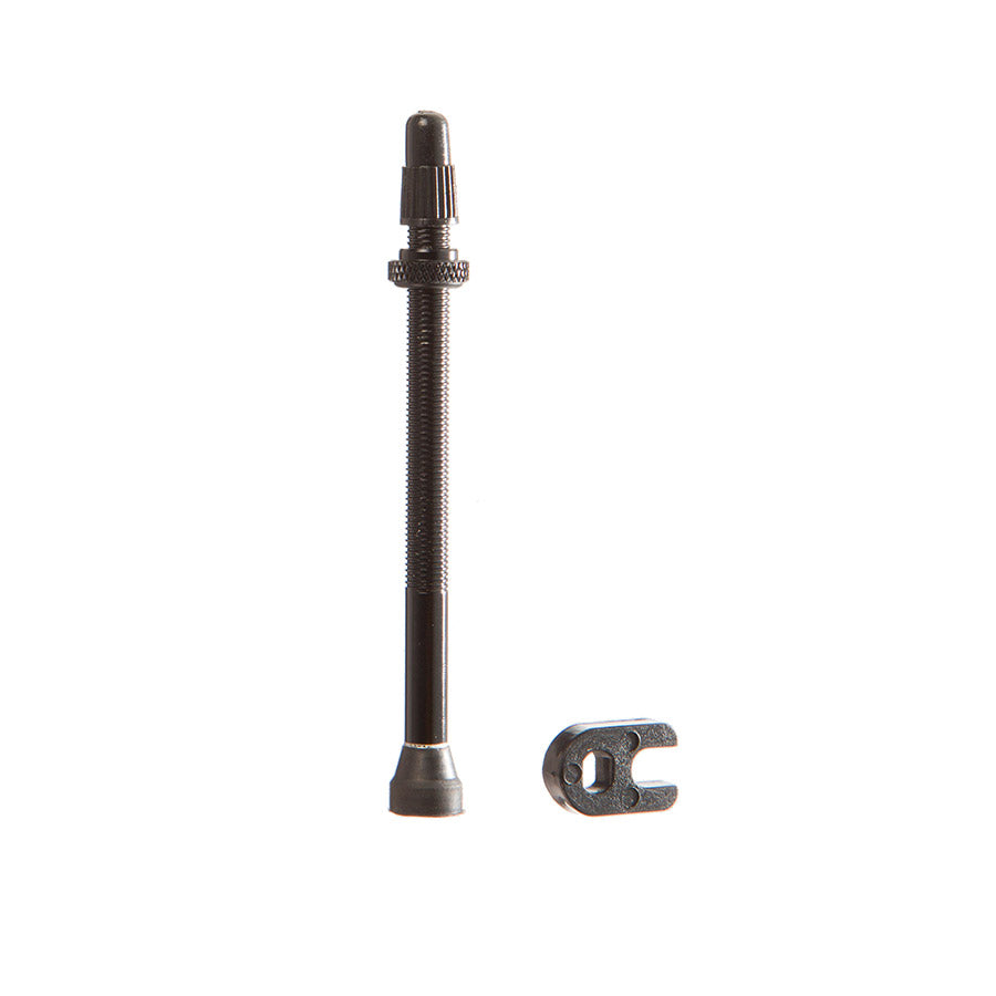 Zipp 80mm universal tubeless valve with presta valve core and wrench, suitable for bike wheels and tubeless tire setups.